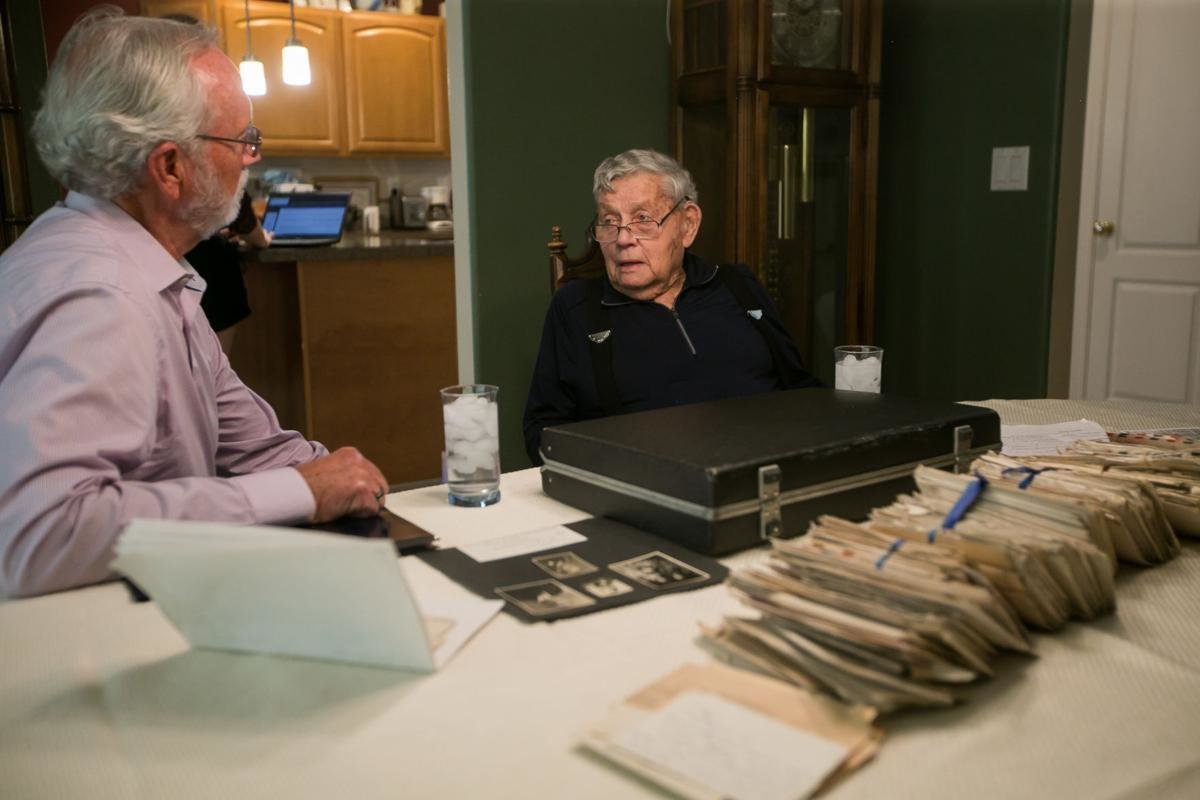 Veteran William Cartwright, right, shares a story during his time serving for the U.S. Army during World War II with U.S. Rep. Dan Newhouse Tuesday, July 14, at his home in Yakima.